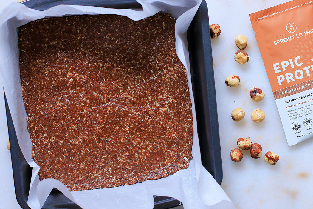 Chocolate Maca Hazelnut Date Squares in pan