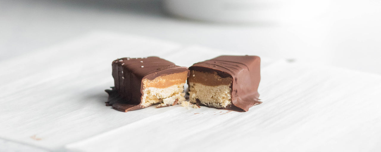 High-Protein "Twix" Bars on parchment paper