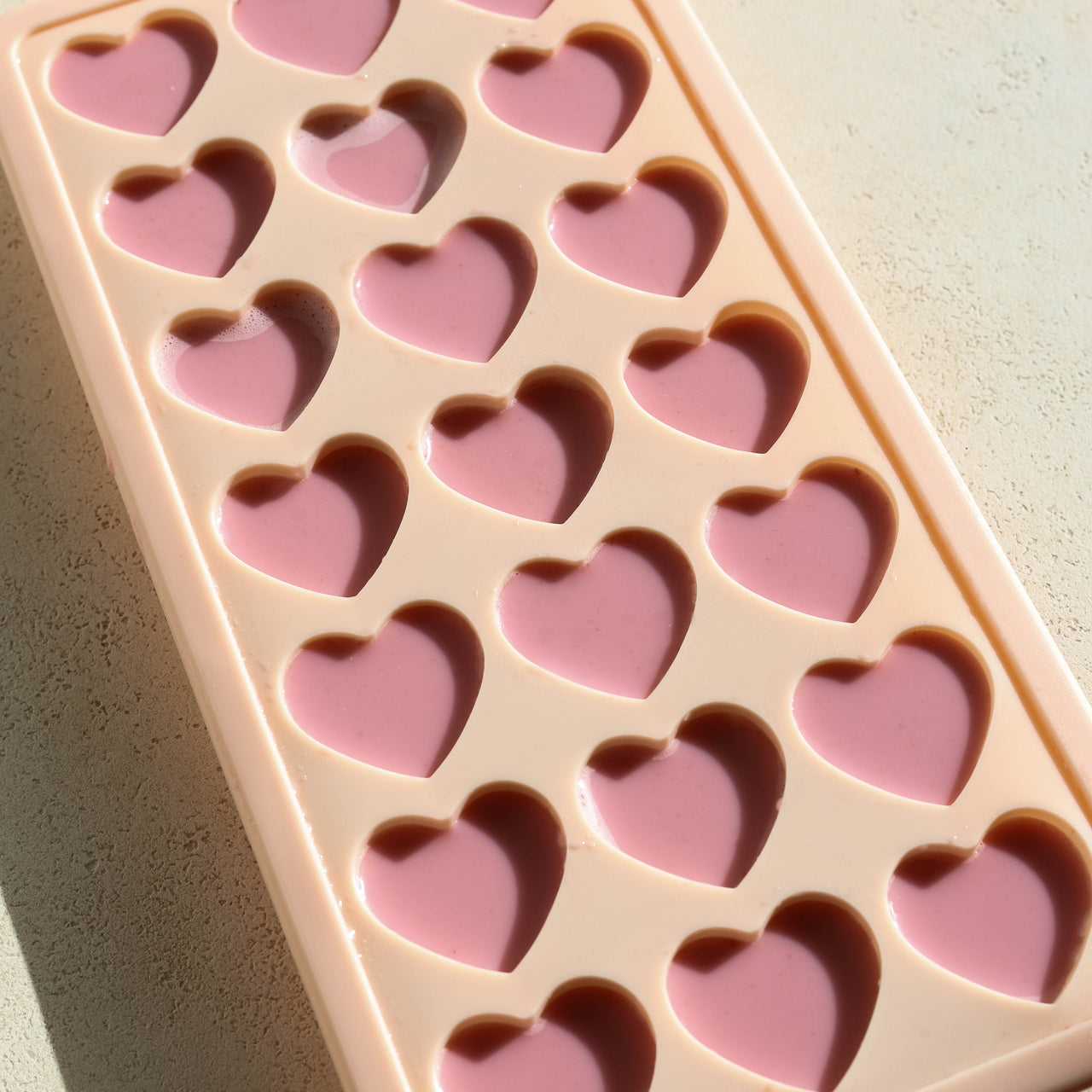 Pink Protein Collagen Coffee Creamer Cubes in tray