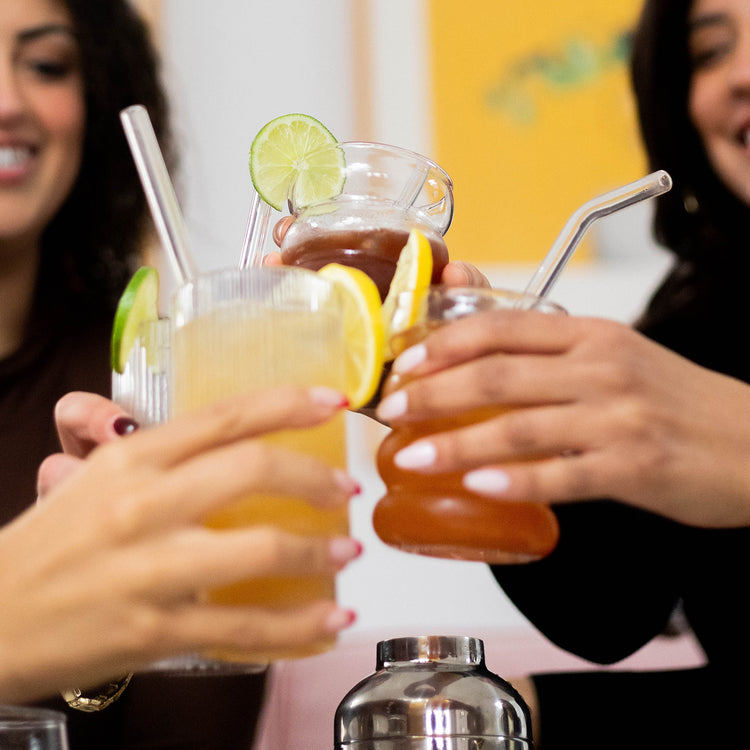 Girls Cheersing with Colorfuel Mocktails
