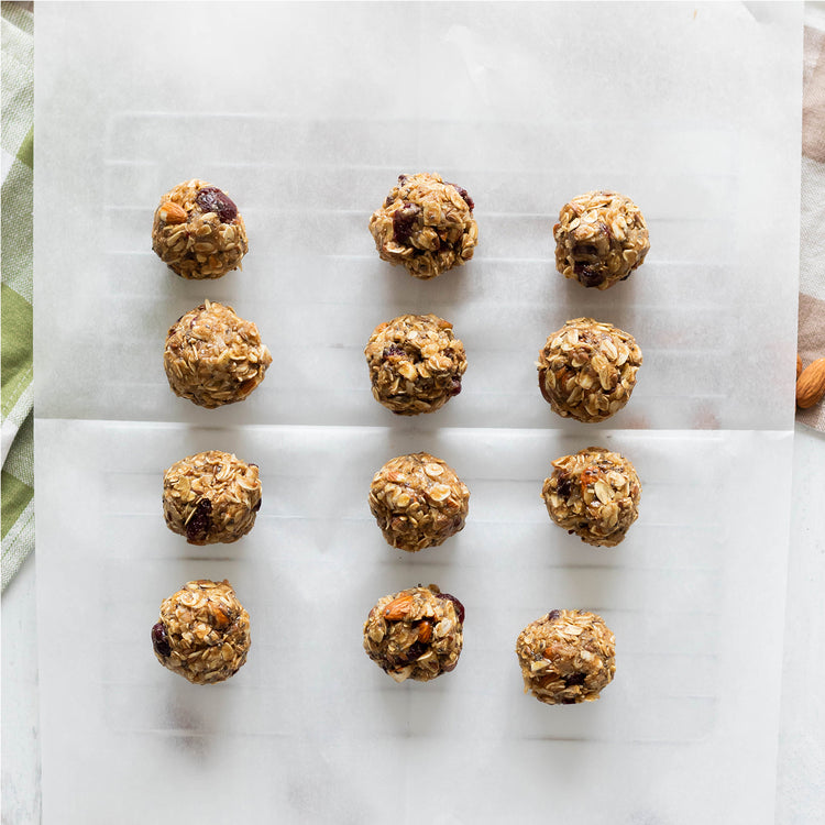 Cranberry Protein Bites on Parchment Paper