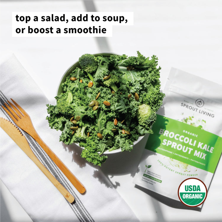 A bowl of kale salad on a white table