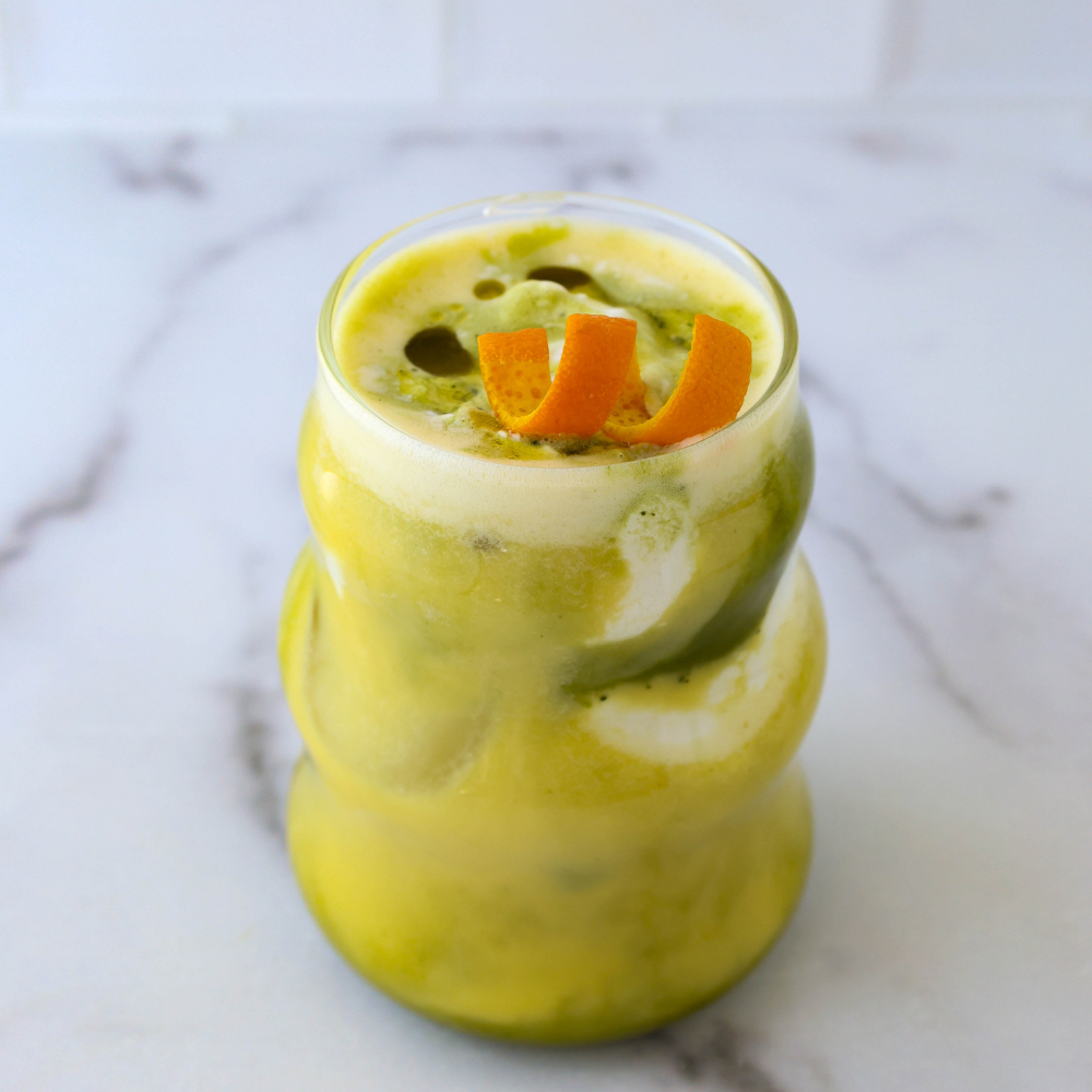 Orange Olive Oil Matcha Latte in glass