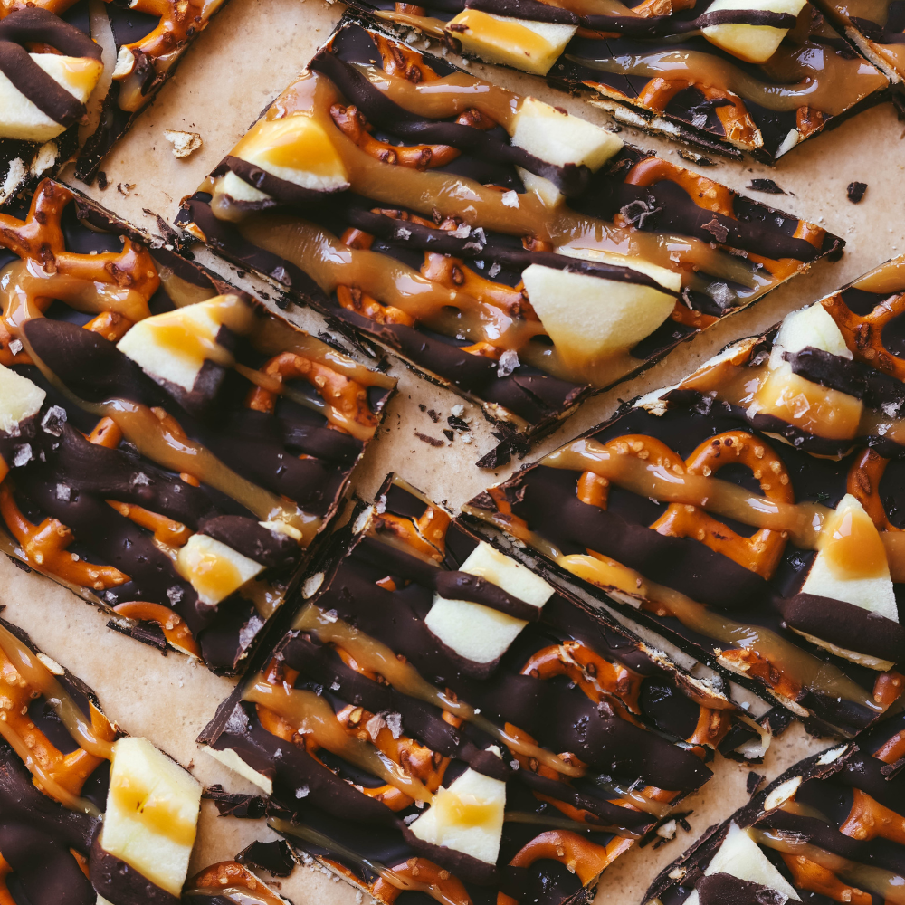 High Protein Caramel Apple Bark on parchment paper