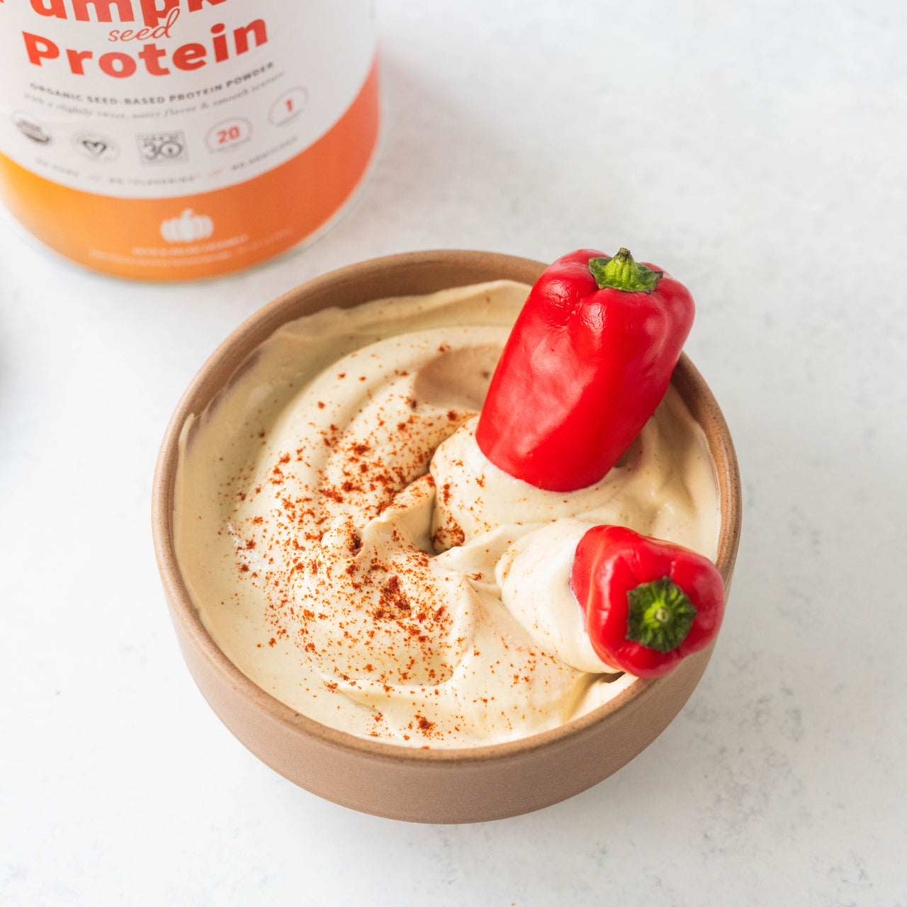 Bowl of Protein Hummus with Red Bell Peppers