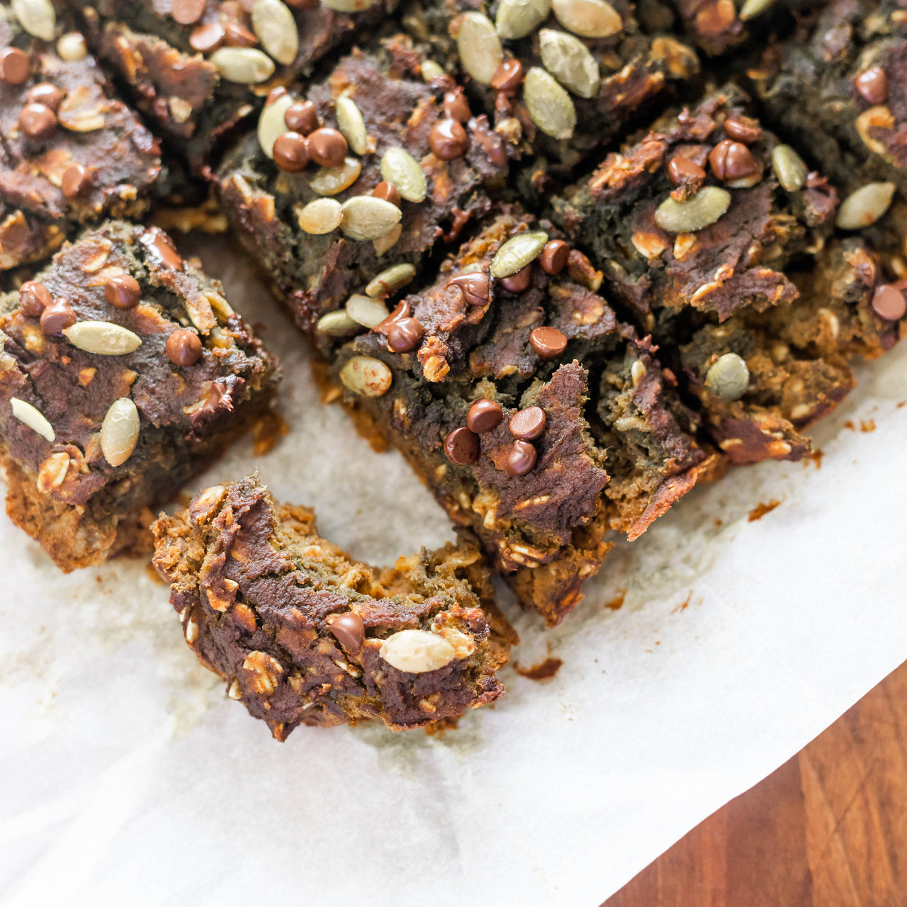 Pumpkin Protein Bars on parchment paper