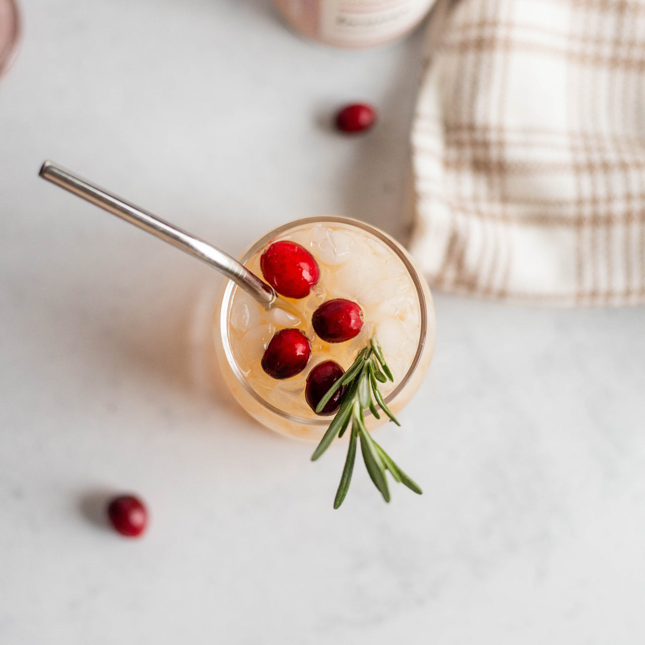 Cranberry Mocktail in glass with jar