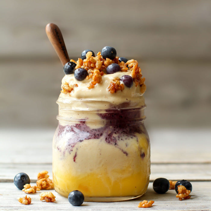 Mango Blueberry Nice Cream in jar with spoon