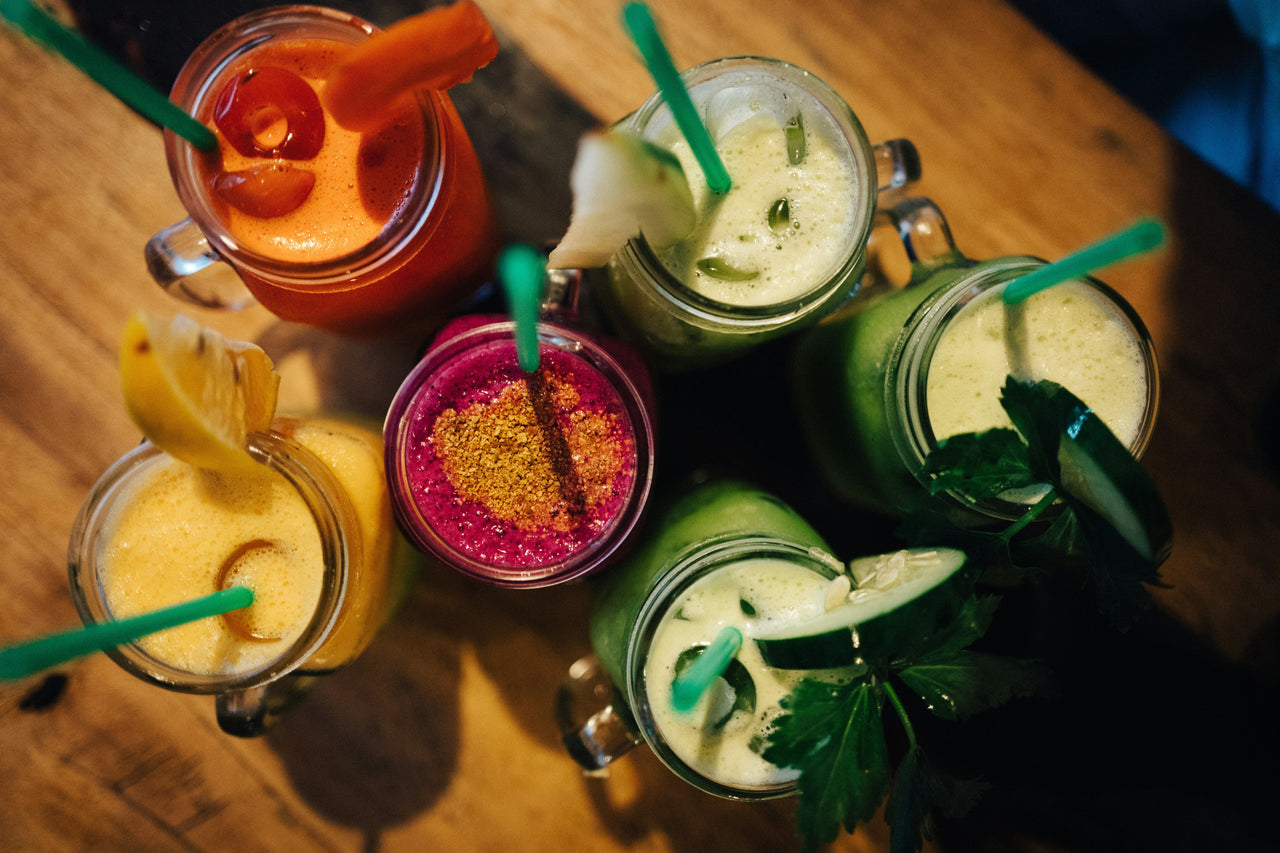 Various protein smoothies on table