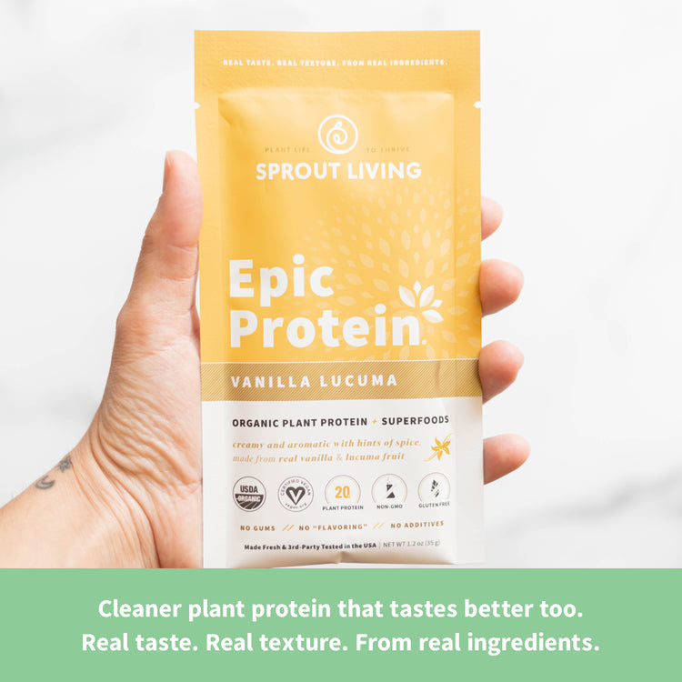 Hand Holding Packet of Epic Protein Vanilla Lucuma