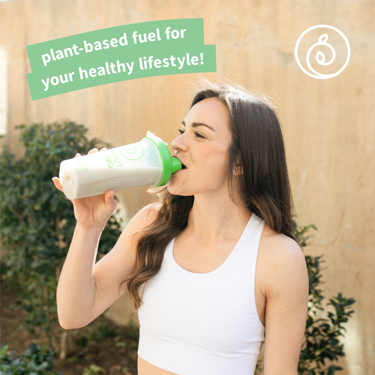 Active Girl Drinking Epic Protein Shake Outside